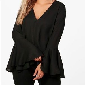 Black top with flute bell sleeves